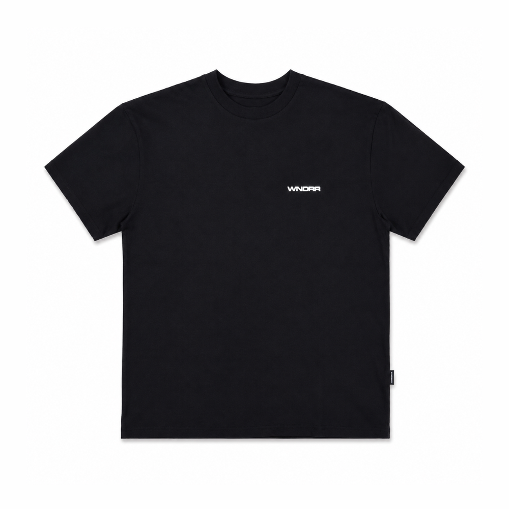 Black WNDRR Refrain box fit tee front view featuring small chest logo and side seam tag
