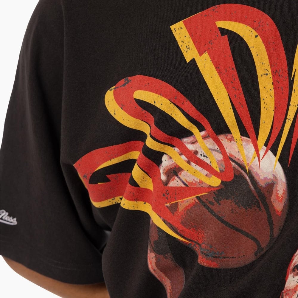 Close-up view of Mitchell & Ness Blaze Tee – Dennis Rodman Chicago Bulls, Faded Black, highlighting vintage wash, bold graphics, and premium fabric details